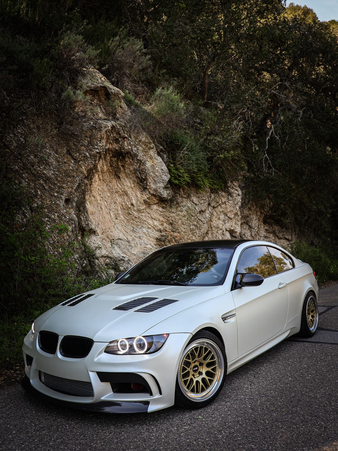 Jared's Alpine White E92 M3 parked on a mountain road